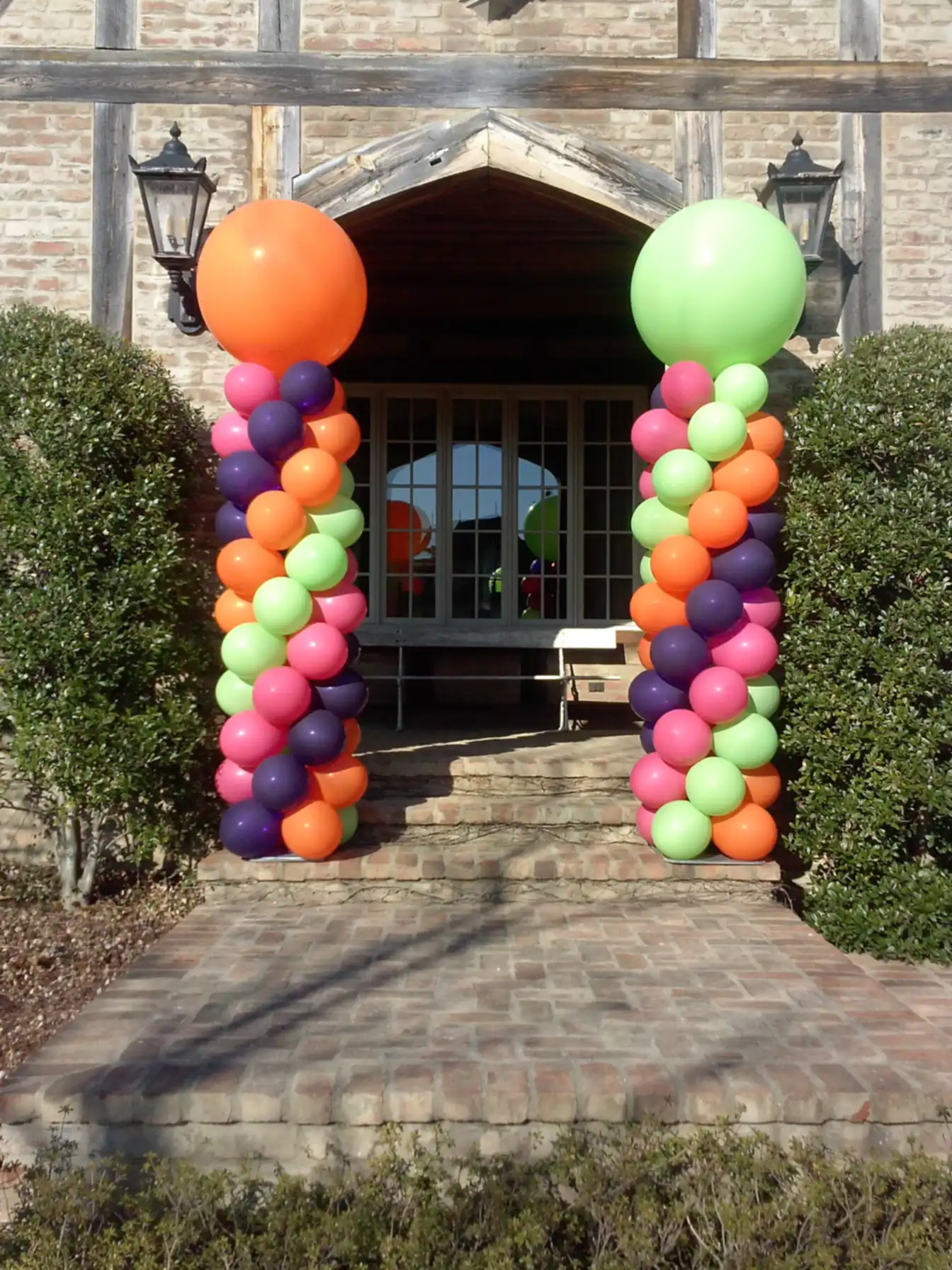 Tall balloon column in bright fruit colors for a Memphis party