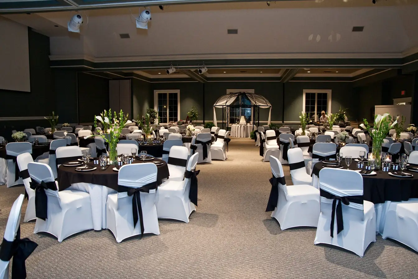 White chair covers with sashes on banquet chairs at a Memphis ballroom event